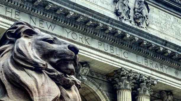 istock Lion guarding the public library in New York, USA. 2040557113
