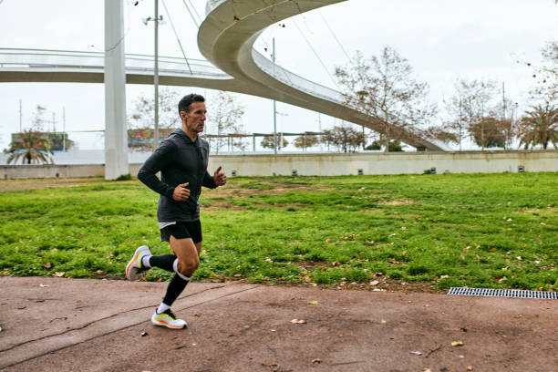 istock Barcelona athlete running outdoors in winter 2040566448