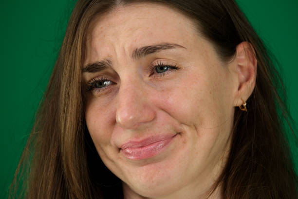 istock emotional break woman portrait, studio shot 2040569859