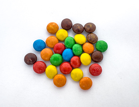 Colorful candies on a white background