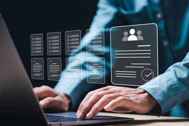 istock HR manager reviews online employee evaluation form for employee recruitment. Human resource management (HR), Check resume, Screening employee information and job applicants. 2040586270