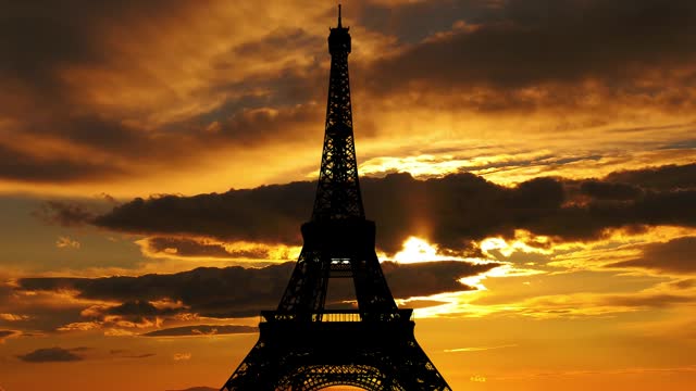 Eiffel Tower in Paris, France (against the background of the sunset)