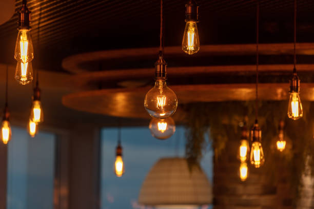 istock Decorative antique edison style filament light bulbs hanging from ceiling 2040590071