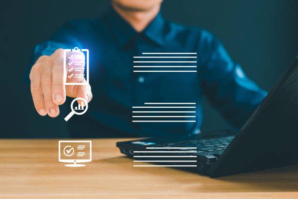istock Business performance checklist Male hands using computer to complete survey, online checklist, filling out digital checklist 2040597551
