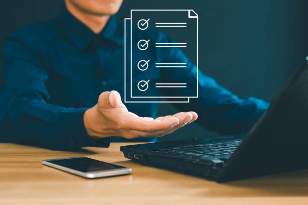 istock Enterprise performance audit: Business owners use computers to conduct online audit surveys, fill out digital audits, and evaluate questionnaires. Evaluation of online surveys 2040605125