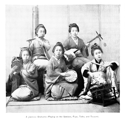 Japanese women playing traditional instruments in an orchestra. Engraving published 1894. Original edition is from my own archives. Copyright has expired and is in Public Domain.