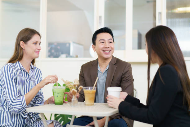 istock Businesspeople drinking a coffee together. 2040609334