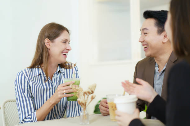 istock Businesspeople drinking a coffee together. 2040609857
