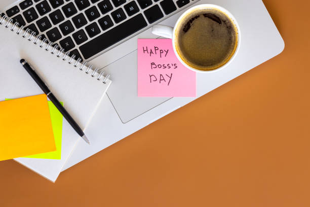 istock Boss day concept, laptop and cup of coffee on table, flat lay. 2040636431