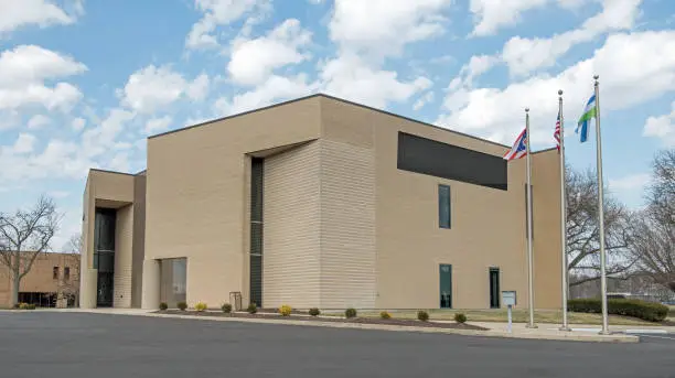 Photo of Corner View of Beige Brick Business Building