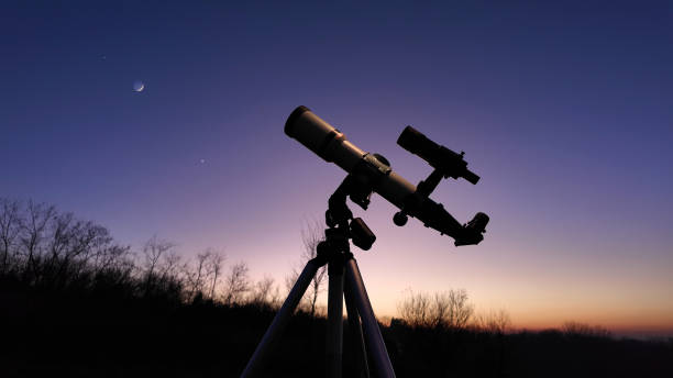 istock Astronomical telescope for observing stars, planets, Moon, celes 2040695238