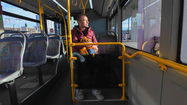 istock Commuter inside a bus at city station. 2040695771