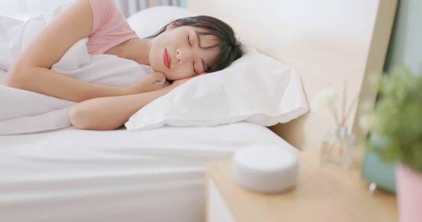 istock asian woman use smartphone alarm 2040708176