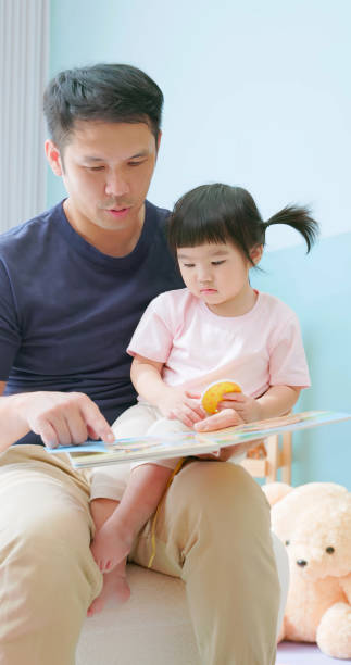 istock asian father accompany child study 2040714088
