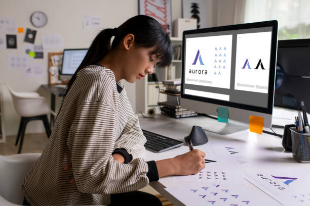 istock Asian Graphic designer working in office. Designing logo Artist Creative Designer Illustrator Graphic Skill Concept. 2040726024