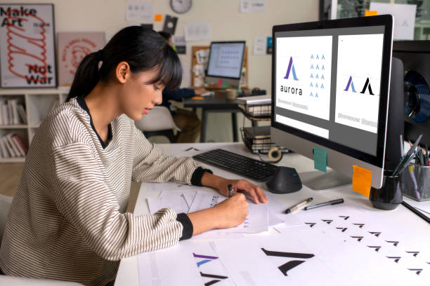 istock Asian Graphic designer working in office. Designing logo Artist Creative Designer Illustrator Graphic Skill Concept. 2040726590