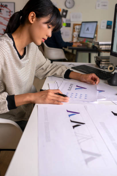 istock Asian Graphic designer working in office. Designing logo Artist Creative Designer Illustrator Graphic Skill Concept. 2040726595