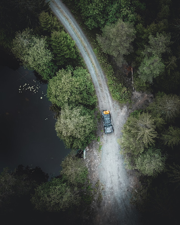 Each photograph captures a solitary Land Rover Defender as it traverses the winding, untamed paths of Sweden's Värmland forests, showcasing the rugged beauty of the natural landscape. The vehicle, a small yet defiant presence among the towering pines, invites the viewer to explore the serene and untouched wilderness. While each image shares the common thread of adventure and exploration, they differ in their perspectives and the interplay of light and shadow, creating unique vignettes of the journey. The series exudes a sense of peaceful exploration and the joy of discovering the road less traveled, encouraging a connection with the wild.

#Sweden #LandRoverDefender #Defender #offroad #VärmlandAdventures #ExploreSweden #WildernessVoyage #NaturePhotography #AdventureTravel #ForestsOfSweden #ScenicDrives #TravelSweden #UntamedNature #Wanderlust #EpicLandscapes #OutdoorExploration #RoadtripGoals #PathLessTraveled #DiscoverSweden #SustainableTravel #EcoTourism #WildSweden #NorthernBeauty #ScandinavianWild #LandRoverLove #AdventureReady #TrailBlazers #IntoTheWoods #PineForestPath #WildAndFree #RoverLife
