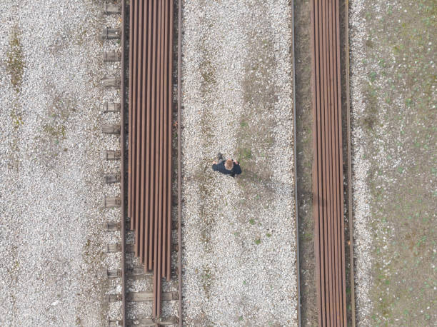 Man is walking to his work place because public transport nor working