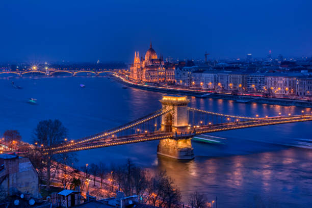 Panorama of Budapest, Hungary, with the Chain Bridge and the Parliament. Budapest city night scene. View at Chain bridge, river Danube and famous building of Parliament. Budapest city is capital of Hungary. blue danube stock pictures, royalty-free photos & images