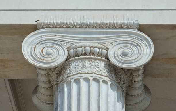 istock greek column pillar detail from ancient greece (museum history archaeology) bank decor ionic curled marble white close up photo blue sky (historic ornate building decor decorated embellishment design) 2040800161