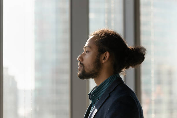 istock Young biracial male worker in formal suit plan successful career 2040821108