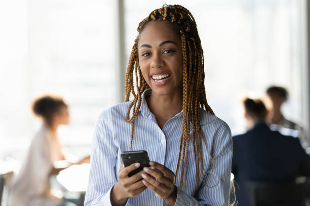 istock Young biracial lady student employee networking online using mobile phone 2040823244