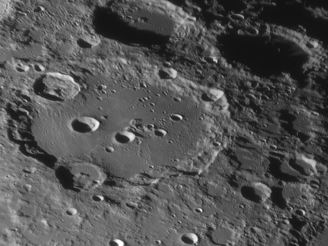 Clavius crater on the surface of the moon. Photo of the lunar surface through a telescope.