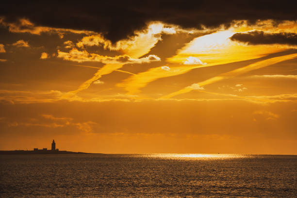 Night photo of Portland Bill lighthouse in Dorset