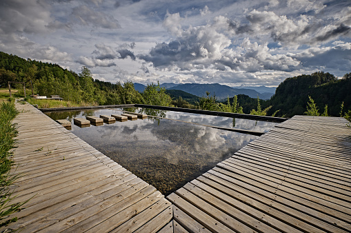 A Bio-pool with beautiful view of volcanic, forest landscape of Southern Chile. Araucania Region, Ko Panqui Lodge for artist residencies