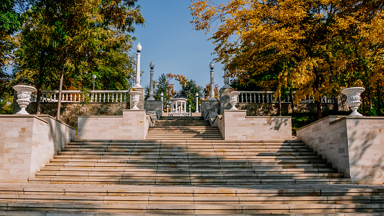 Staircase and sculptures at the northwestern entrance to the Parco della Montagnola in Bologna Italy