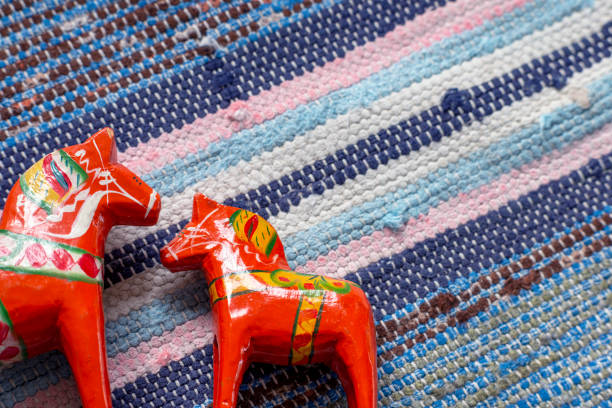 istock Dala Horse on old woven rag rug 2040908097
