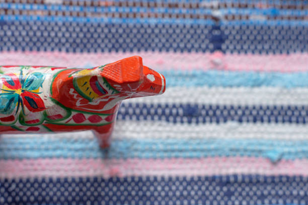 istock Dala Horse on old woven rag rug 2040908101
