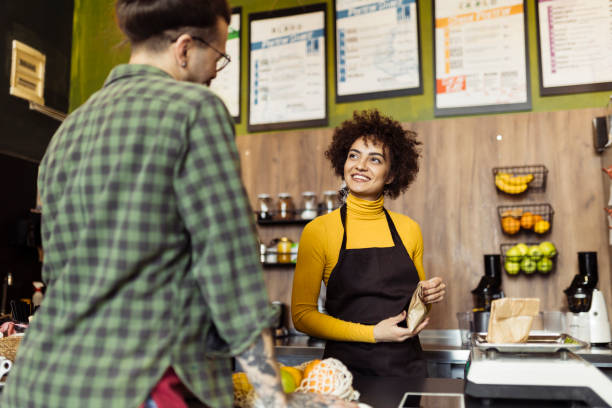 istock Man shopping grocery in the small store 2040916133