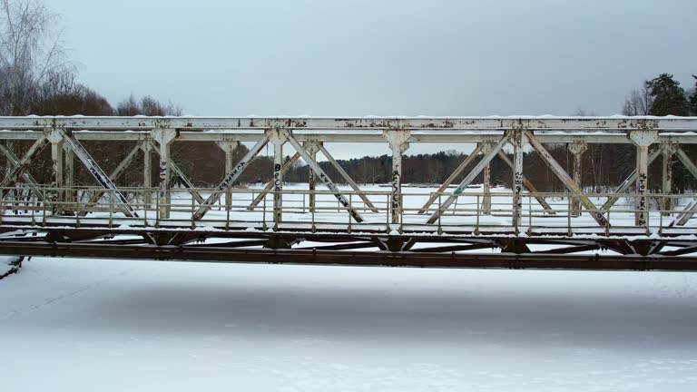 Small Bridge Over Frozen River Drone Footage