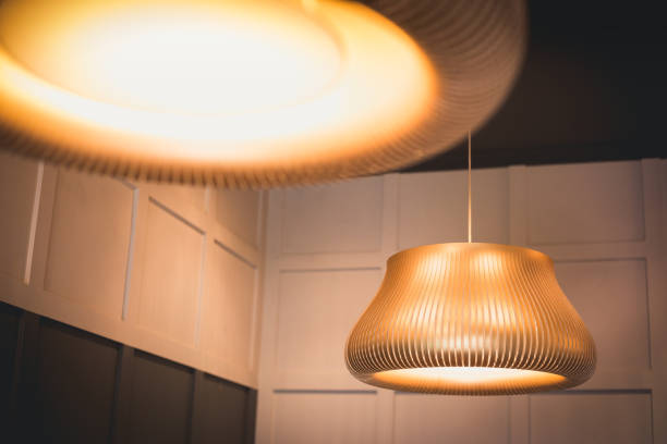 istock Modern vintage design of lamp in home. A hanging light on ceiling 2040941695