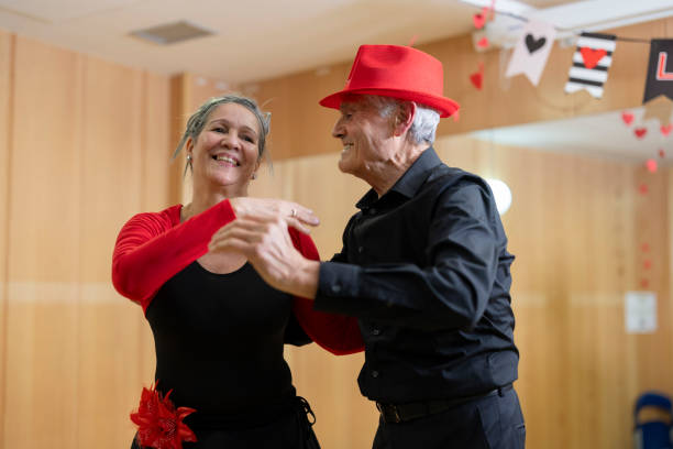 istock Senior couple in love dancing tango at a social gathering 2040958559