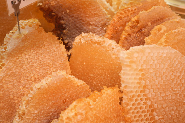 istock close up of fresh honey with comp in a jar 2040977971