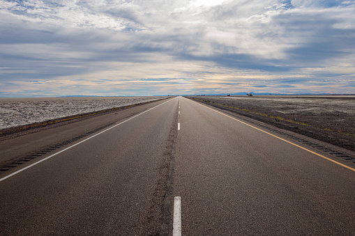 A long empty stretch  of highway