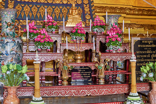 Religious offering at Wihan Phra Mongkhon Bophit temple. Ayutthaya. Phra Nakhon Si Ayutthaya province. Thailand.