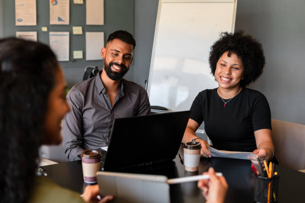istock business people presenting project at meeting 2040996705