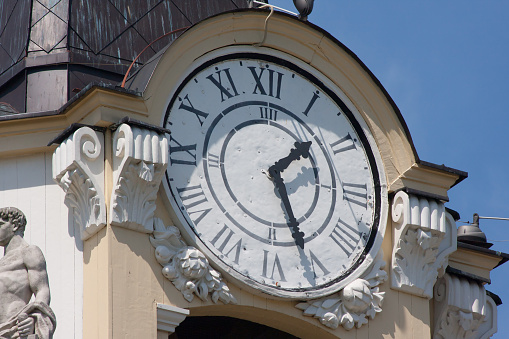 Restored historic clock on the tower in Bialystok, Poland