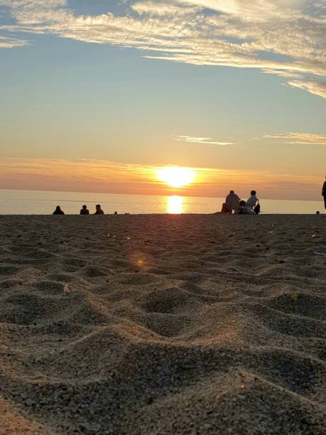 istock Couples Watching the Sunset at the Beach 2041000868