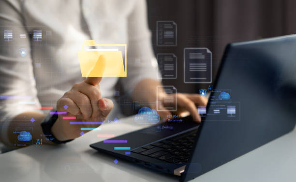 istock Process automation to efficiently manage files. Businesswoman working on laptop with virtual screen.Online documentation database and document management system concept. 2041004508