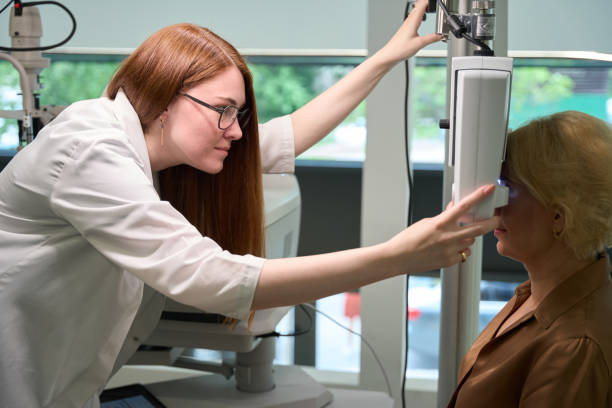 istock Red-haired doctor uses a dioptrimeter in her work 2041017647