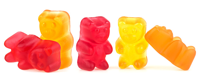 Collection of colored jelly bears isolated on a white background. Fruity jelly bear candy.