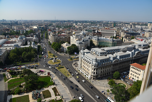 Bucharest skyline seen from a tall building in the center of the town. The image was captured during summer season.