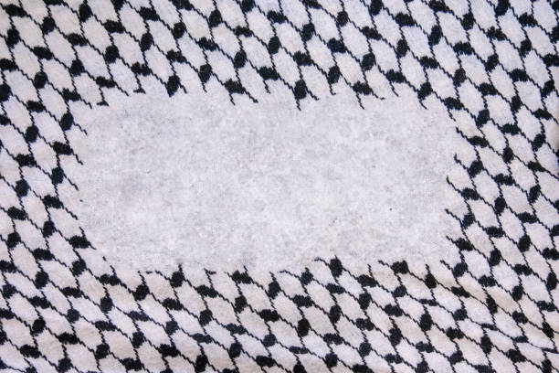 Resilience Woven: A Tactical Palestinian Keffiyeh, Symbolizing Heritage Amidst Conflict