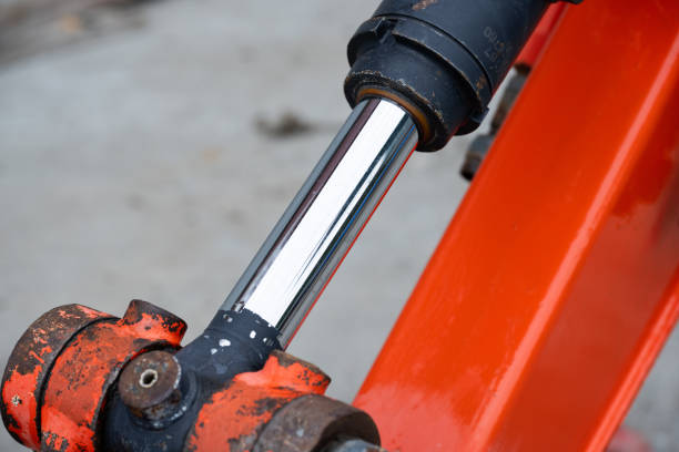 istock Hydraulics of a red excavator boom arm. 2041136863