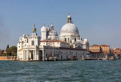 Venice, Italy - September 6, 2022: View from Canal of San Marco to Punta della Dogana and Salute in Venice